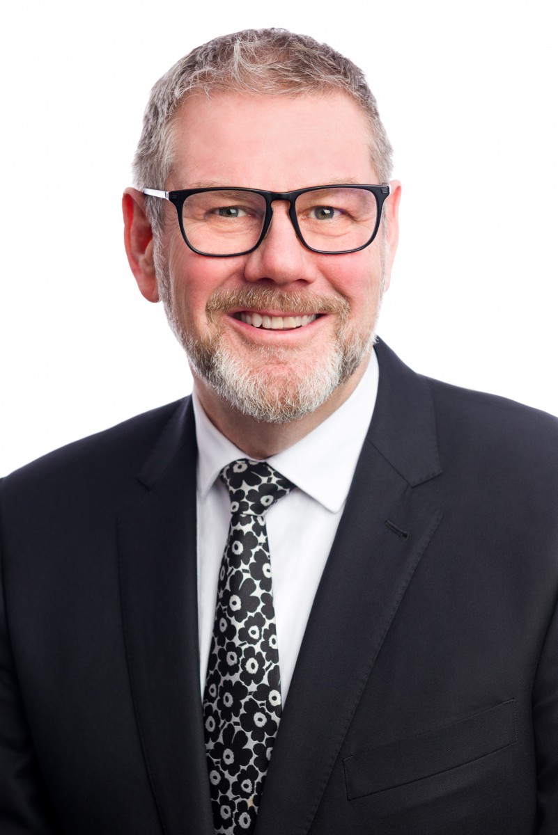 <who>Photo credit: Kelowna International Airport</who>Geoff Ritchie is the director of commercial and air service at Kelowna International Airport.