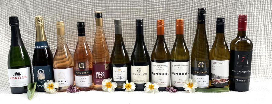 <who>Photo credit: Steve MacNaull/NowMedia Group</who>Say hello to spring with these wines. From left, Road 13 Sparkling Chenin Blanc 2018 ($45), Evolve 2018 Brut Rose ($50), Evolve 2023 Rose (wine club only), Gray Monk 2023 Rose ($21), See Ya Later Ranch 2022 Nelly Rose ($20), Mission Hill 2021 Reserve Chardonnay ($27), Tinhorn Creek 2023 Chardonnay ($25), Sandhill 2023 Terroir Driven Pinot Gris ($22), Sandhill 2023 Terroir Driven Chardonnay ($21), Gray Monk 2023 Riesling ($21), Red Rooster 2022 Pinot 3 ($21) and Township 7 Benchmark Series 2023 Sauvignon Blanc (wine club only)..